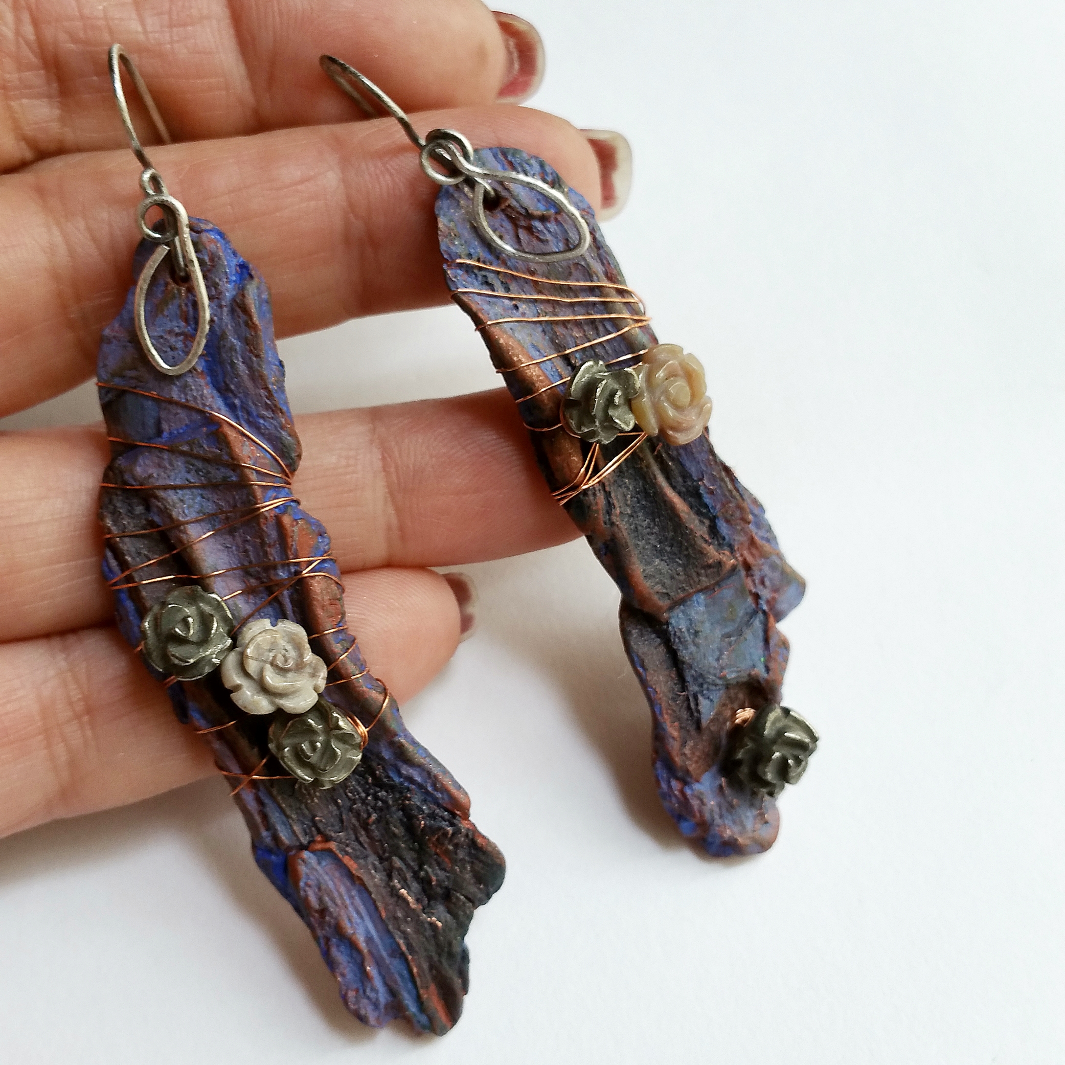 these "barky" polymer clay were made by Helen Backhouse from UK, with carved roses of Indian Agate and Pyrite, Copper and Sterling Silver.
